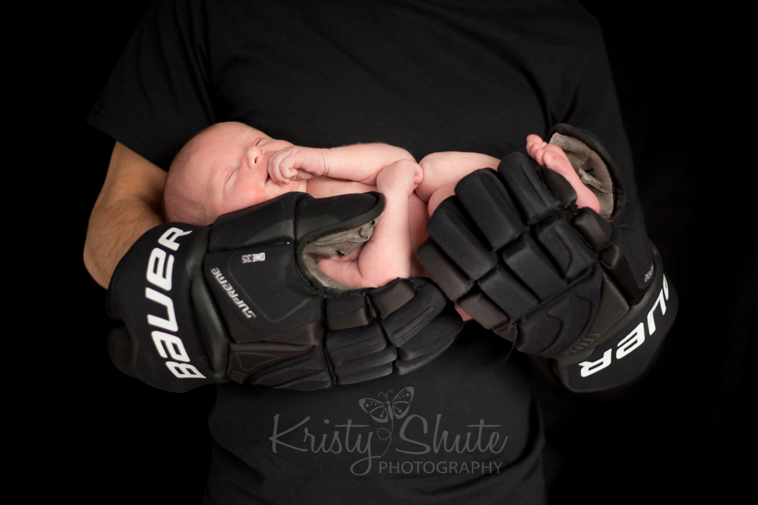 Kristy Shute Photography Kitchener Newborn Boy hockey gloves