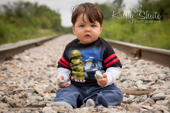Boy on Train Tracks